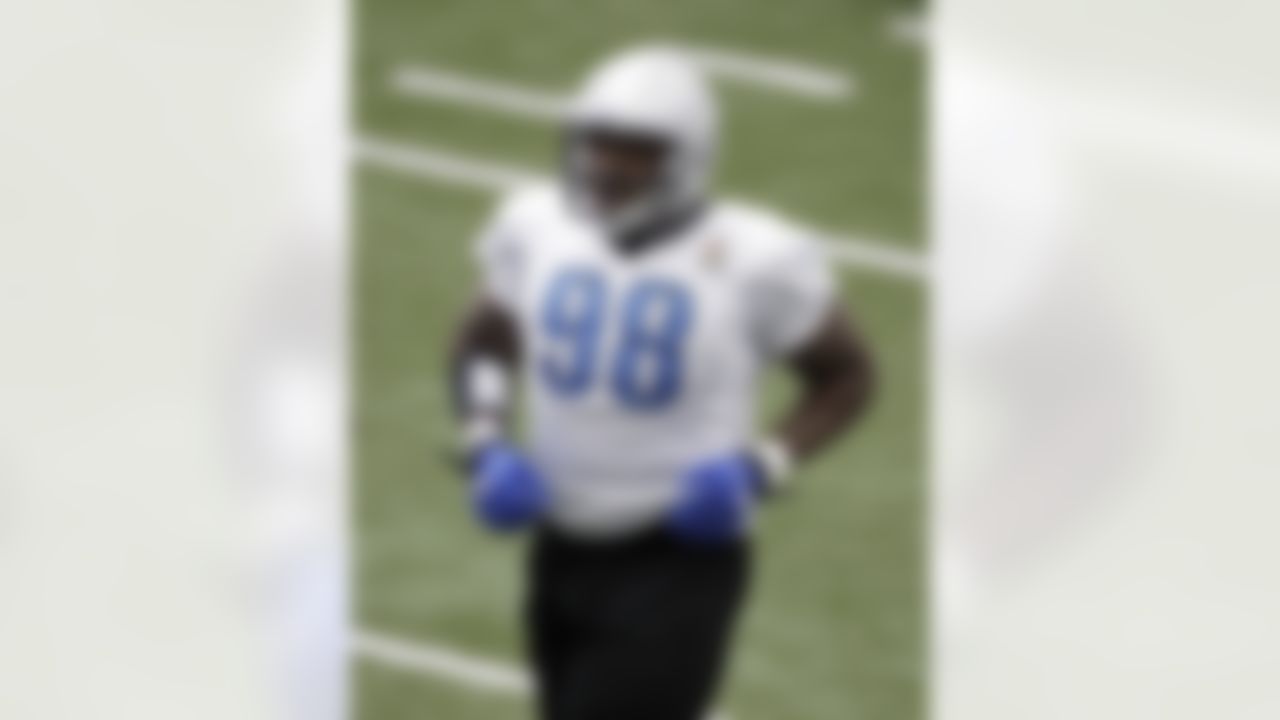 Detroit Lions defensive tackle Nick Fairley runs during their NFL football training camp practice at the teams indoor training facility in Allen Park, Mich., Friday, July 29, 2011. (AP Photo/Paul Sancya)