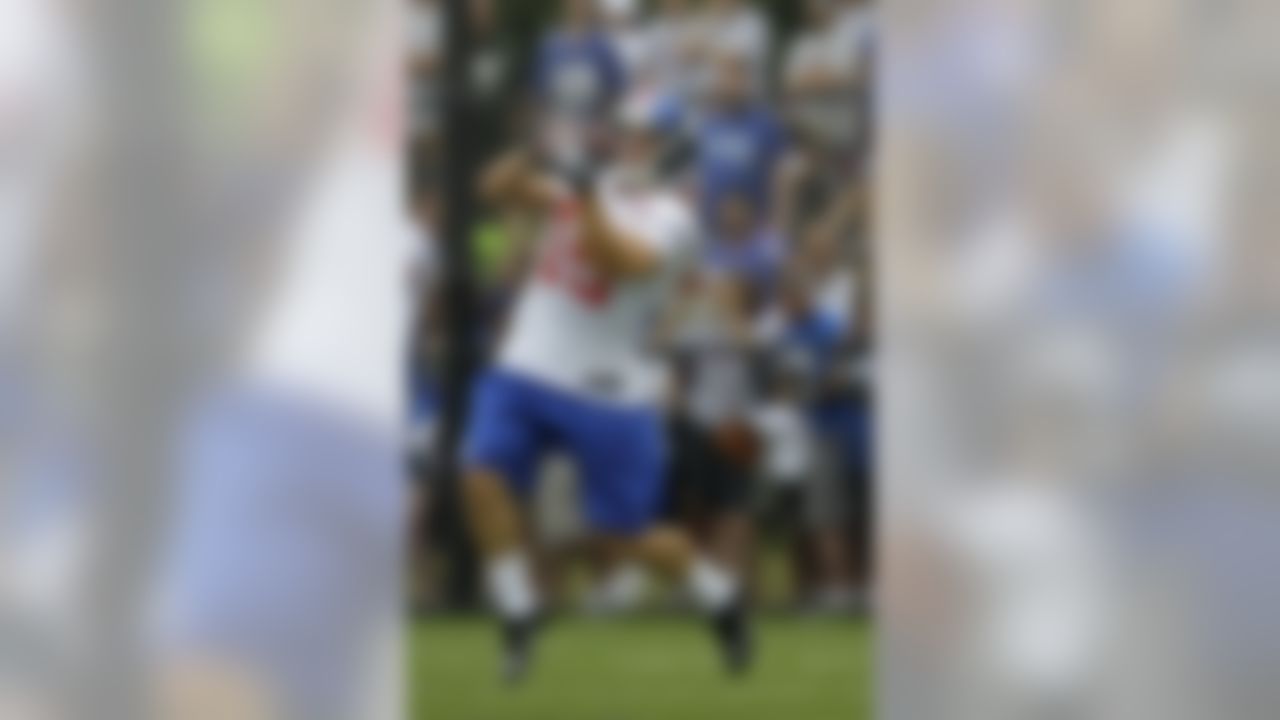 New York Giants wide receiver David Douglas (19) catches a pass during an afternoon practice at the New York Giants NFL football training camp in Albany, N.Y., Saturday, July 28, 2012. (AP Photo/Kathy Willens)