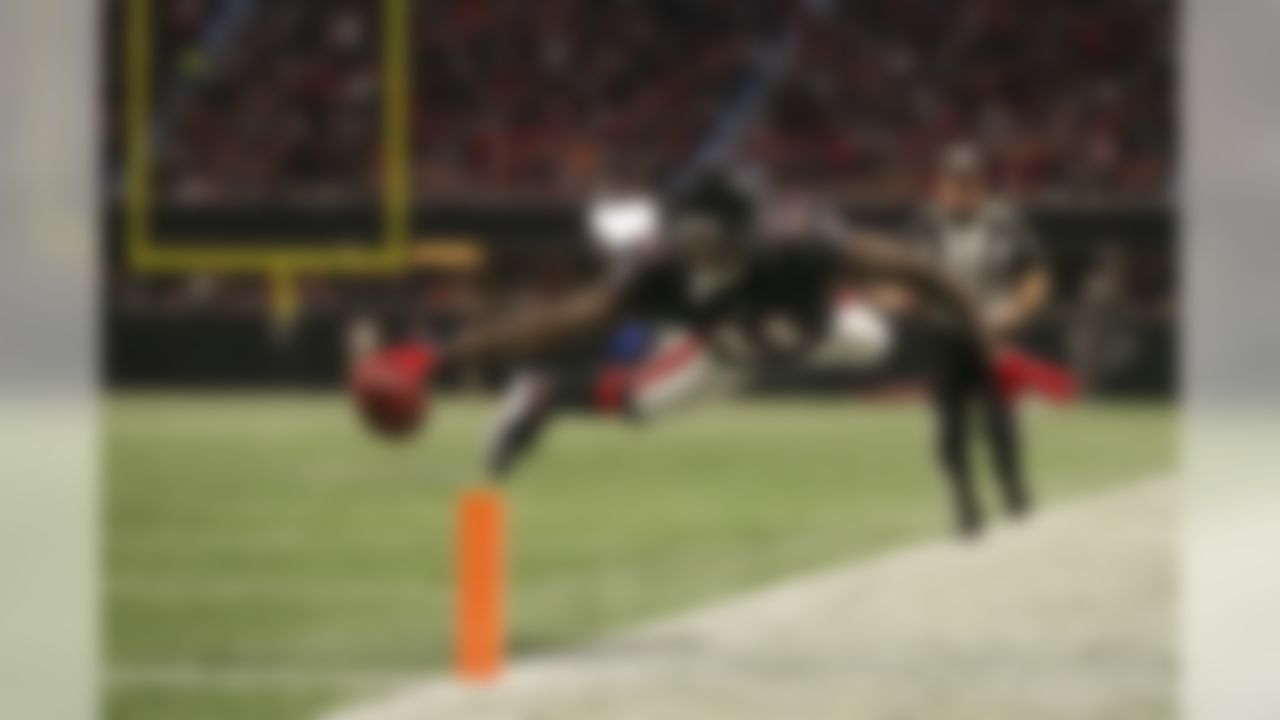 Atlanta Falcons wide receiver Julio Jones (11) dives for a touchdown during a game against the Tampa Bay Buccaneers, Sunday, Nov. 26, 2017, in Atlanta. (Logan Bowles/NFL)