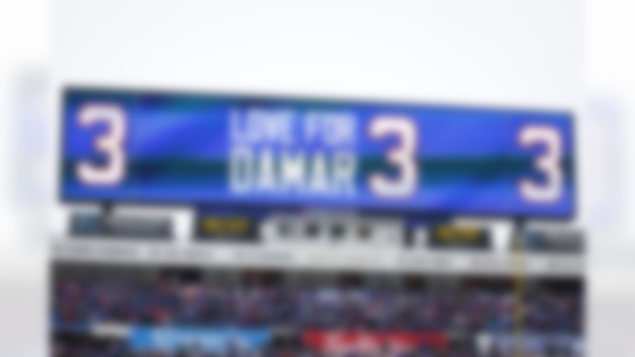 Signs in support of Buffalo Bills safety Damar Hamlin are displayed before an NFL football game against the New England Patriots, Sunday, Jan. 8, 2023, in Orchard Park, N.Y.