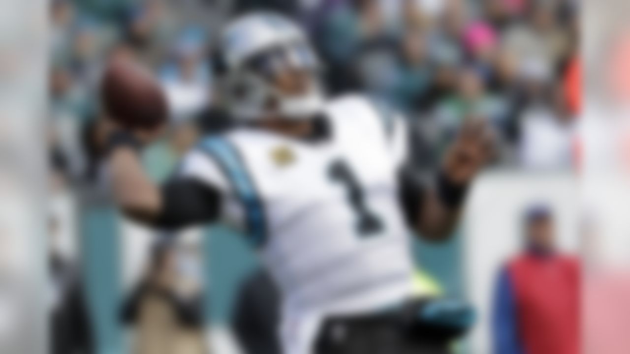 Carolina Panthers quarterback Cam Newton throws a pass against the Philadelphia Eagles during the first half of an NFL football game, Sunday, Oct. 21, 2018, in Philadelphia. (AP Photo/Michael Perez)