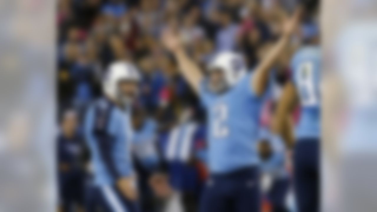 Tennessee Titans kicker Rob Bironas (2) reacts with holder Brett Kern (6) after kicking the game-winning field goal in the fourth quarter of an NFL football game against the Pittsburgh Steelers on Thursday, Oct. 11, 2012, in Nashville, Tenn. The Titans won 26-23. (AP Photo/Joe Howell)