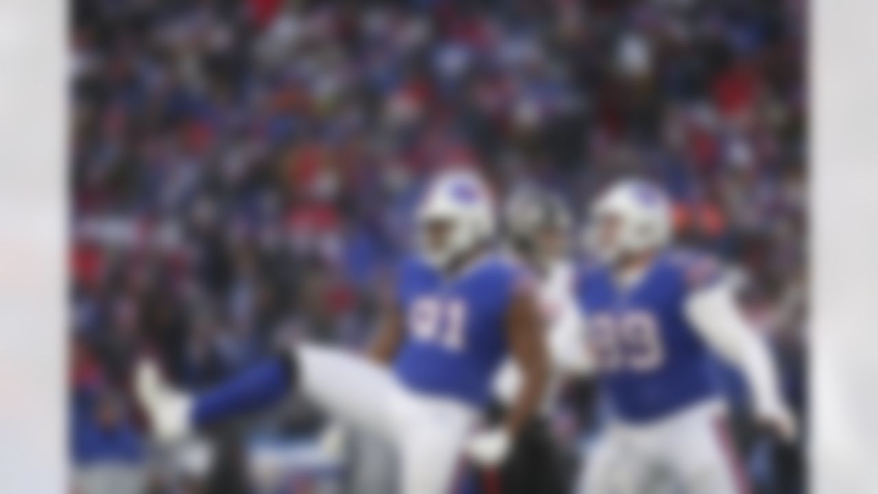 Buffalo Bills' Ed Oliver (91) celebrates with Harrison Phillips (99) during the second half of an NFL football game Sunday, Jan. 2, 2022, in Orchard Park, N.Y.