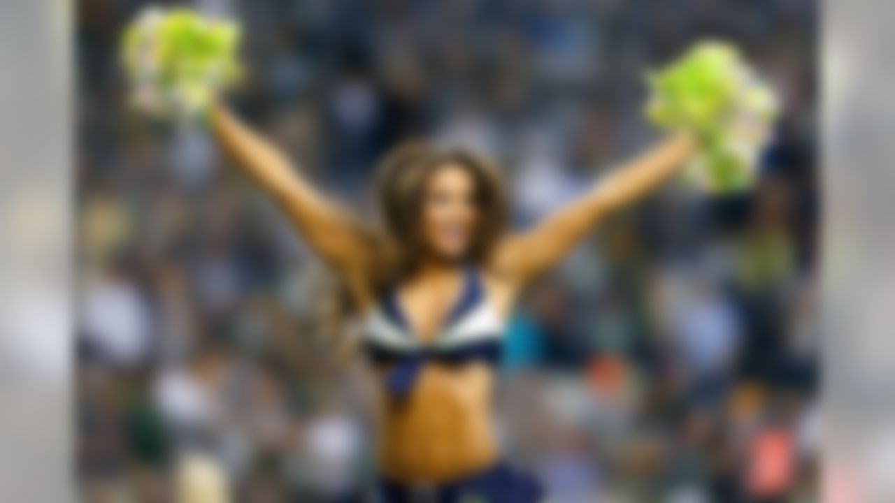 A Seattle Seahawks cheerleader performs during an NFL football game against the Green Bay Packers at CenturyLink Field on Thursday September 4, 2014 in Seattle, Washington. (Aaron M. Sprecher/NFL)