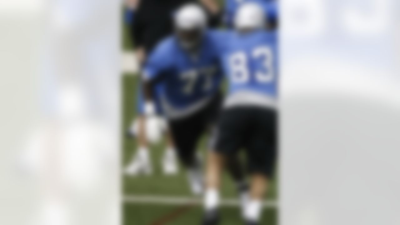 ALLEN PARK, MI - MAY 03: Gosder Cherilus #77 of the Detroit Lions does a drill behind Jawad Nesheiwat #83 during rookie training camp at the Detroit Lions Headquarters and Training Facility on May 3, 2008 in Allen Park, Michigan. (Photo by Gregory Shamus/Getty Images)