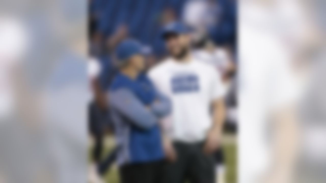 Indianapolis Colts head coach Chuck Pagano talks with Andrew Luck before an NFL football game against the Houston Texans, Sunday, Dec. 31, 2017, in Indianapolis. (AP Photo/AJ Mast)