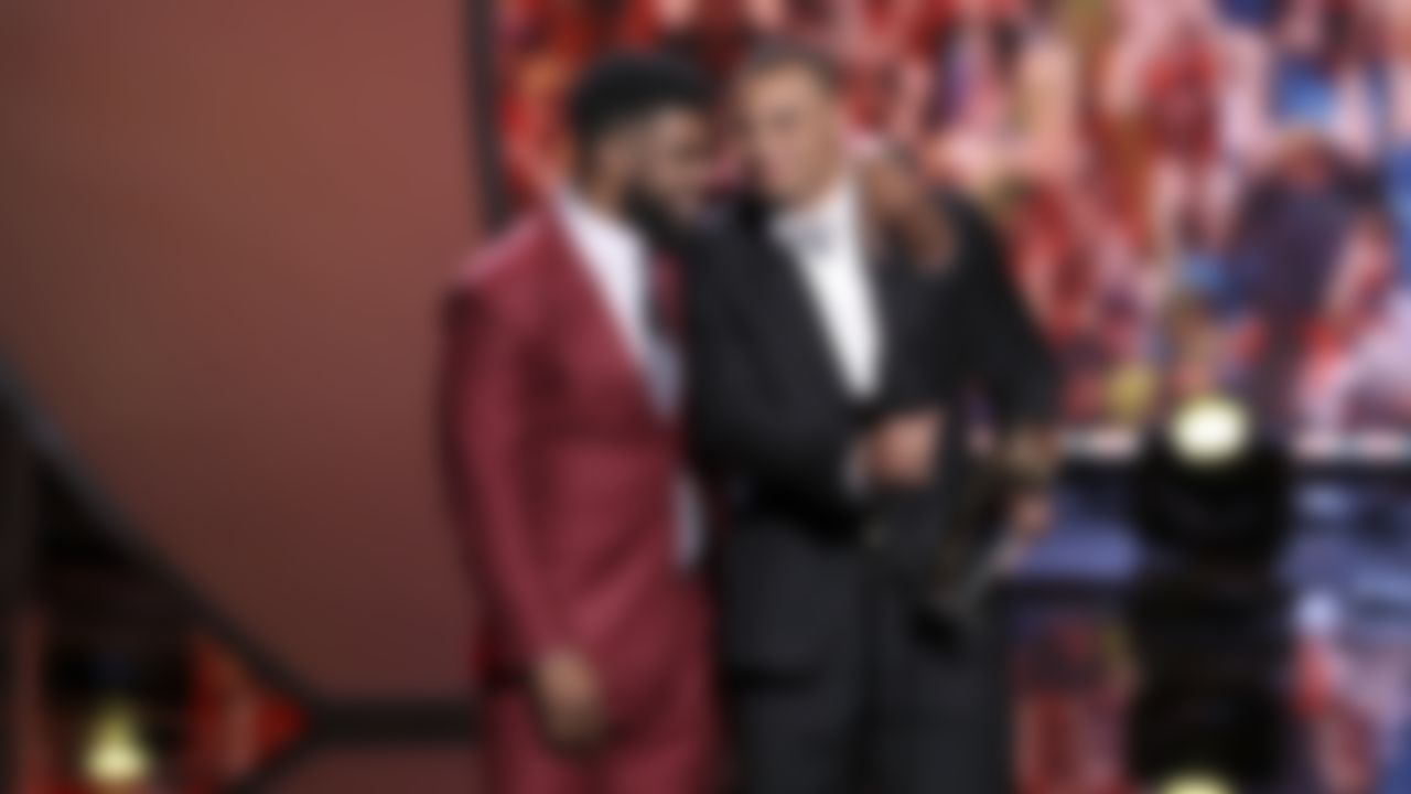 Dallas Cowboys quarterback Dak Prescott accepts the AP Offensive Rookie of the Year award as Dallas Cowboys running back Ezekiel Elliott looks on during the 6th annual NFL Honors award show at the Wortham Theater Center on Saturday, Feb. 4, 2017 in Houston.