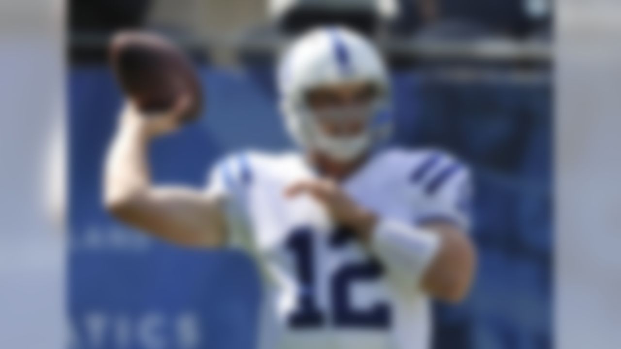 Indianapolis Colts quarterback Andrew Luck (12) warms up before an NFL football game against the Chicago Bears in Chicago, Sunday, Sept. 9, 2012. (AP Photo/Jim Prisching)