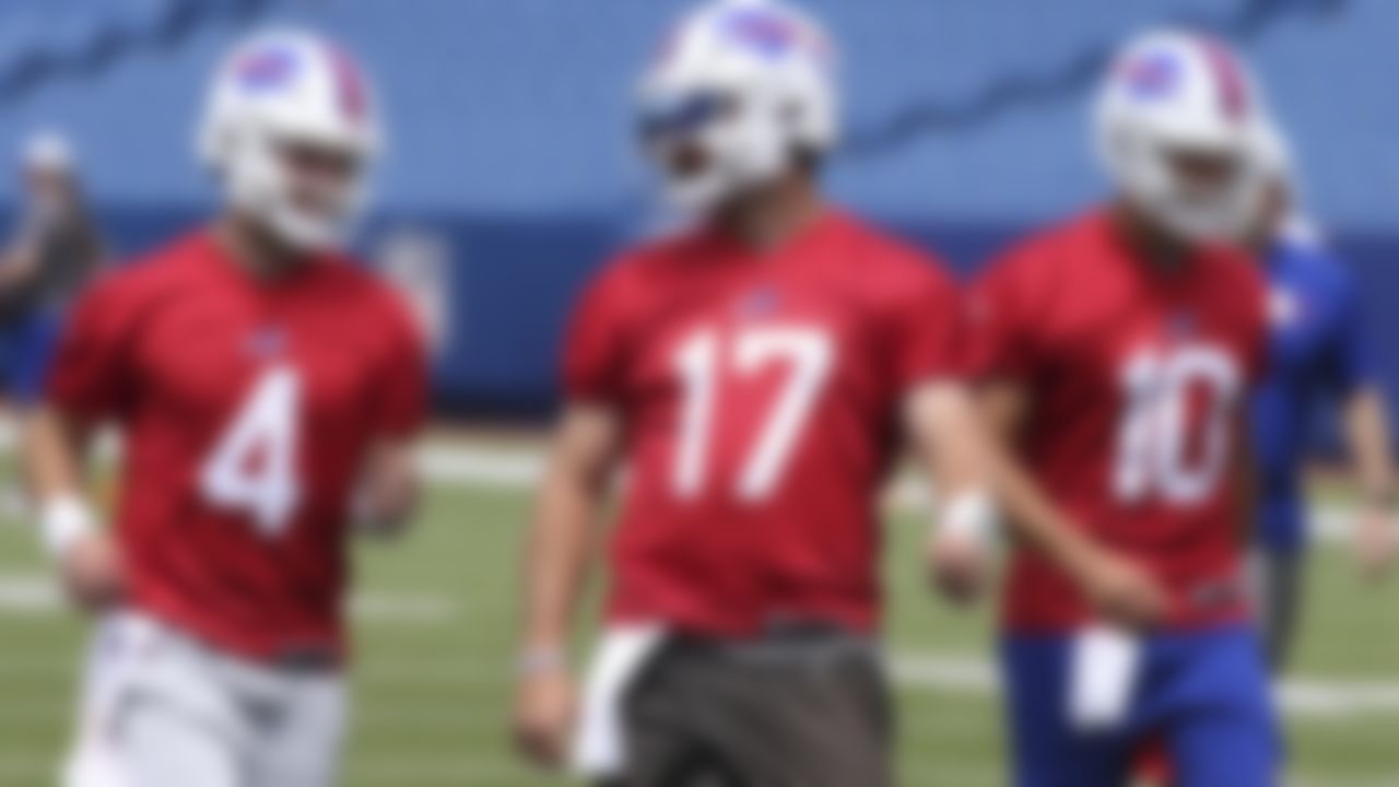 Buffalo Bills quarterbacks Jake Fromm (4) Josh Allen (17) and Mitchell Trubisky (10) run drills during the NFL football team's organized team activities in Orchard Park, N.Y., Wednesday, June 2, 2021.