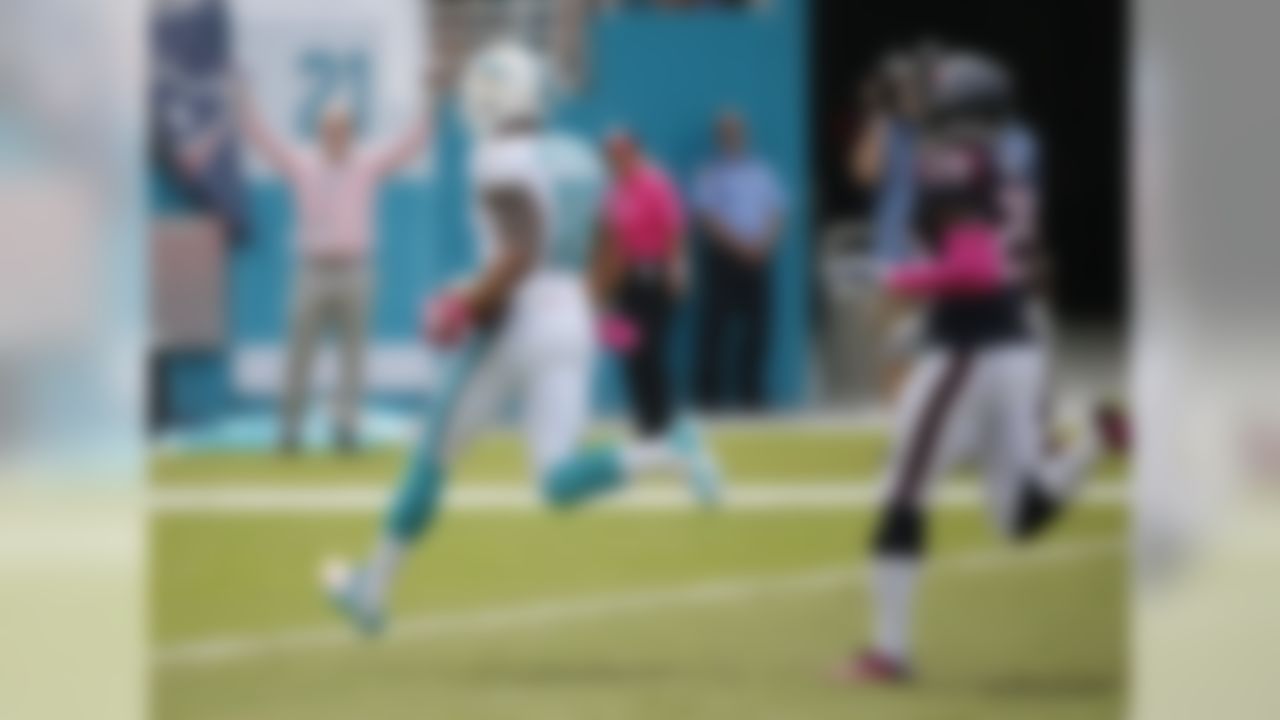 Miami Dolphins wide receiver Rishard Matthews (18) out runs Houston Texans defensive back Andre Hal (29) to the end zone for a touchdown, during the first half of an NFL football game, Sunday, Oct. 25, 2015 in Miami Gardens , Fla. (AP Photo/Wilfredo Lee)