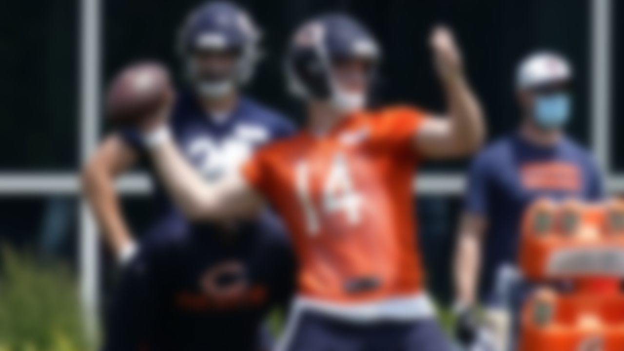 Chicago Bears quarterback Andy Dalton looks to pass during NFL football practice in Lake Forest, Ill., Wednesday, June 2, 2021.