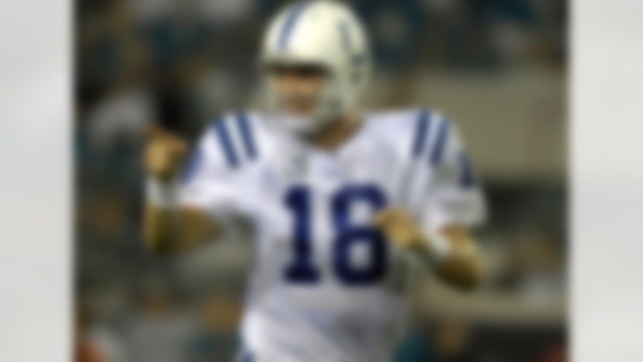 JACKSONVILLE, FL - OCTOBER 22: Quarterback Peyton Manning #18 of the Indianapolis Colts points to the bench after tossing a touchdown pass against the Jacksonville Jaguars at the Jacksonville Municipal Stadium on October 22, 2007 in Jacksonville, Florida. The Colts defeated the Jags 29-7. (Photo by Al Messerschmidt/Getty Images)