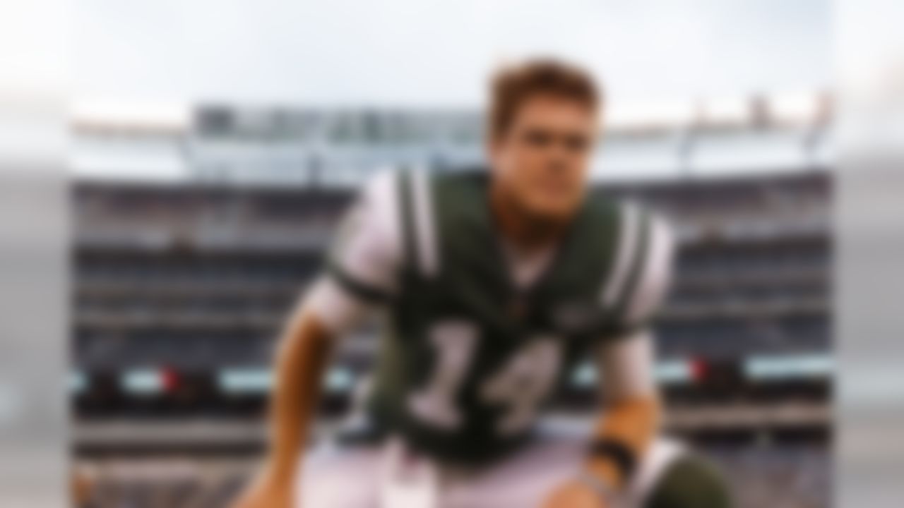 New York Jets quarterback Sam Darnold (14) stretches prior to an NFL preseason football game, Friday, Aug. 10, 2018, in East Rutherford, N.J. The Jets defeated the Falcons, 17-0.