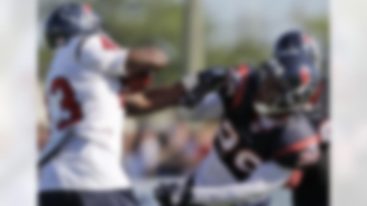 Houston Texans cornerback Glover Quin (29) defends against running back Ben Tate (43) during an NFL football training camp practice Sunday, Aug. 1, 2010, in Houston. (AP Photo/David J. Phillip)
