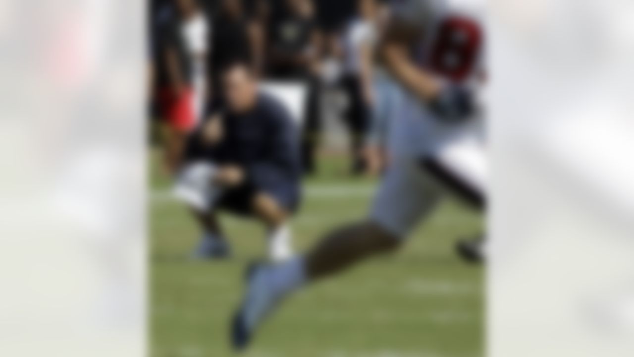 Houston Texans coach Gary Kubiak, left, watches a play during a NFL football training camp practice Monday, Aug. 2, 2010 in Houston. (AP Photo/David J. Phillip)