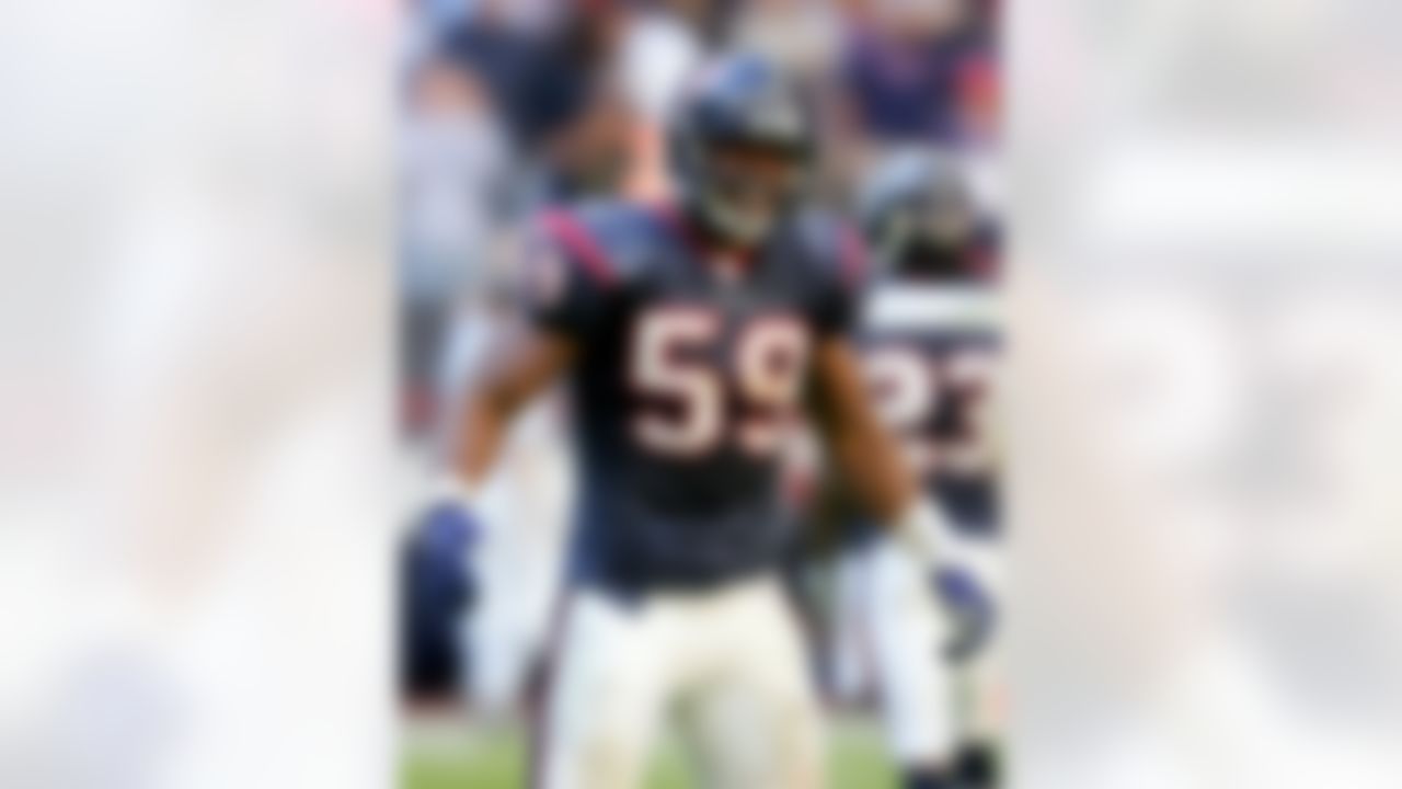 HOUSTON, TX - DECEMBER 31:  DeMeco Ryans #59 of the Houston Texans celebrates in the final minutes against the Cleveland Browns on December 31, 2006 at Reliant Stadium in Houston, Texas.  The Texans defeated the Browns 14-6. Photo by Getty Images.