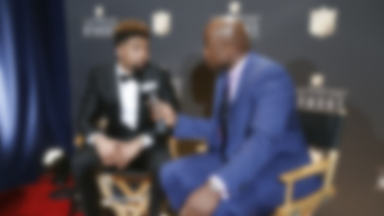 Odell Beckham talks with NFL Network's Akbar Gbaja-Biamila backstage after winning the Art Rooney Award during the 4th Annual NFL Honors awards show at the Phoenix Symphony Hall on Saturday, January 31, 2015 in Phoenix, AZ.