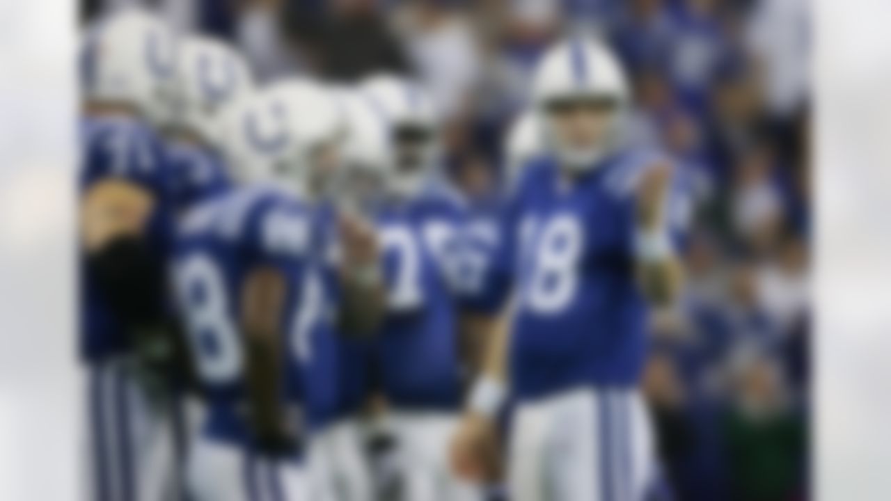 INDIANAPOLIS - DECEMBER 19: Peyton Manning #18 of the Indianapolis Colts calls the play in the huddle during the game against the Baltimore Ravens on December 19, 2004 at the RCA Dome in Indianapolis, Indiana. The Colts defeated the Ravens 20-10. (Photo by Elsa/Getty Images)