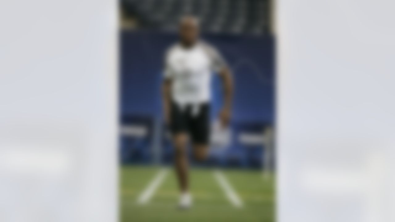 Receiver Jermichael Finley of Texas runs a drill at the NFL Combine in Indianapolis, Saturday, Feb. 23, 2008. (AP Photo/Michael Conroy)
