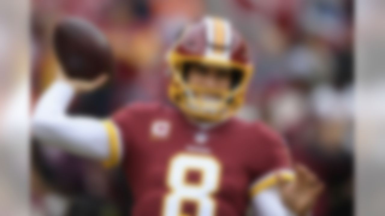 Washington Redskins quarterback Kirk Cousins (8) warms up before an NFL football game against the Denver Broncos in Landover, Md., Sunday, Dec 24, 2017. (AP Photo/Nick Wass)