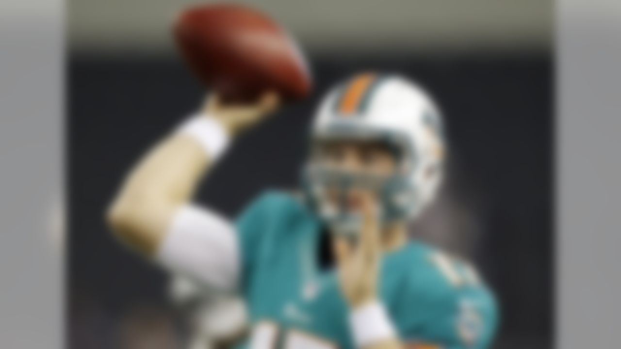 Miami Dolphins quarterback Ryan Tannehill (17) warms up before a preseason NFL football game against the Dallas Cowboys, Wednesday, Aug. 29, 2012, in Arlington, Texas. (AP Photo/LM Otero)