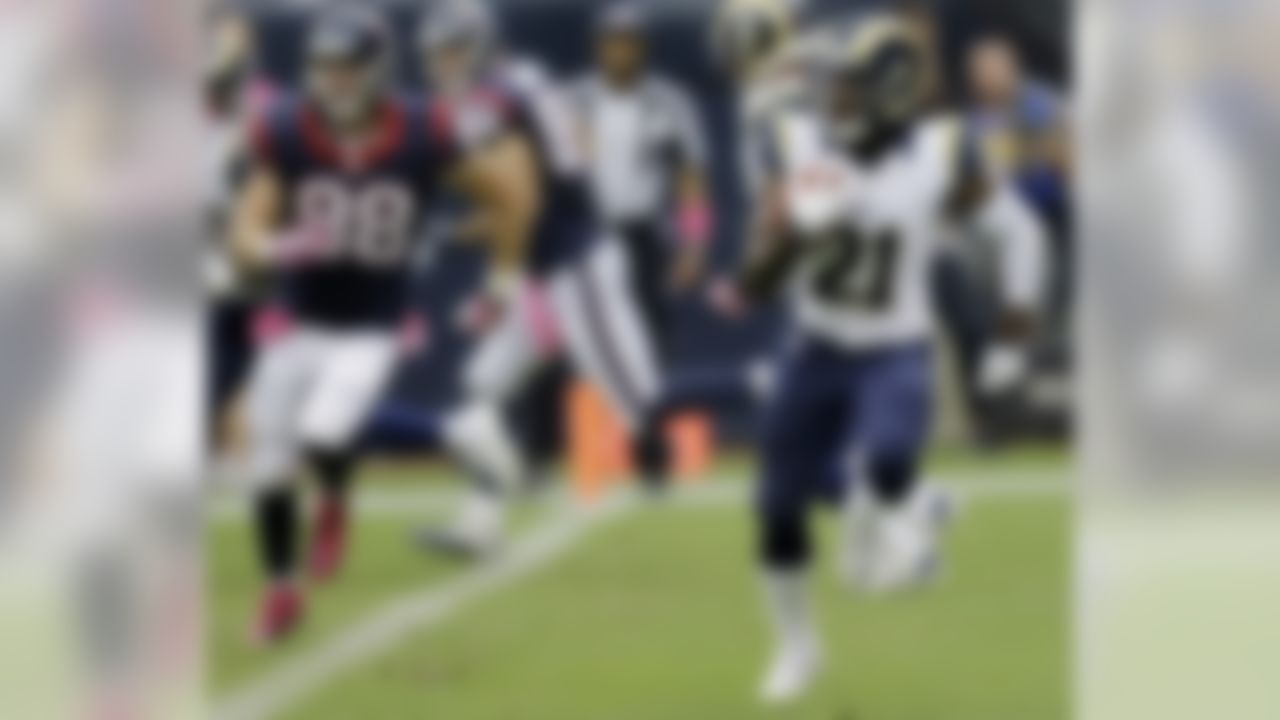 St. Louis Rams cornerback Janoris Jenkins (21) runs back an interception from Houston Texans quarterback T.J. Yates during the fourth quarter of an NFL football game Sunday, Oct. 13, 2013, in Houston, Texas. The Rams won 38-13. (AP Photo/Eric Gay)