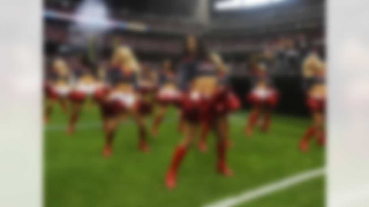 Houston Texans cheerleaders perform before an NFL wild card playoff football game against the Cincinnati Bengals Saturday, Jan. 5, 2013, in Houston. (AP Photo/Patric Schneider)