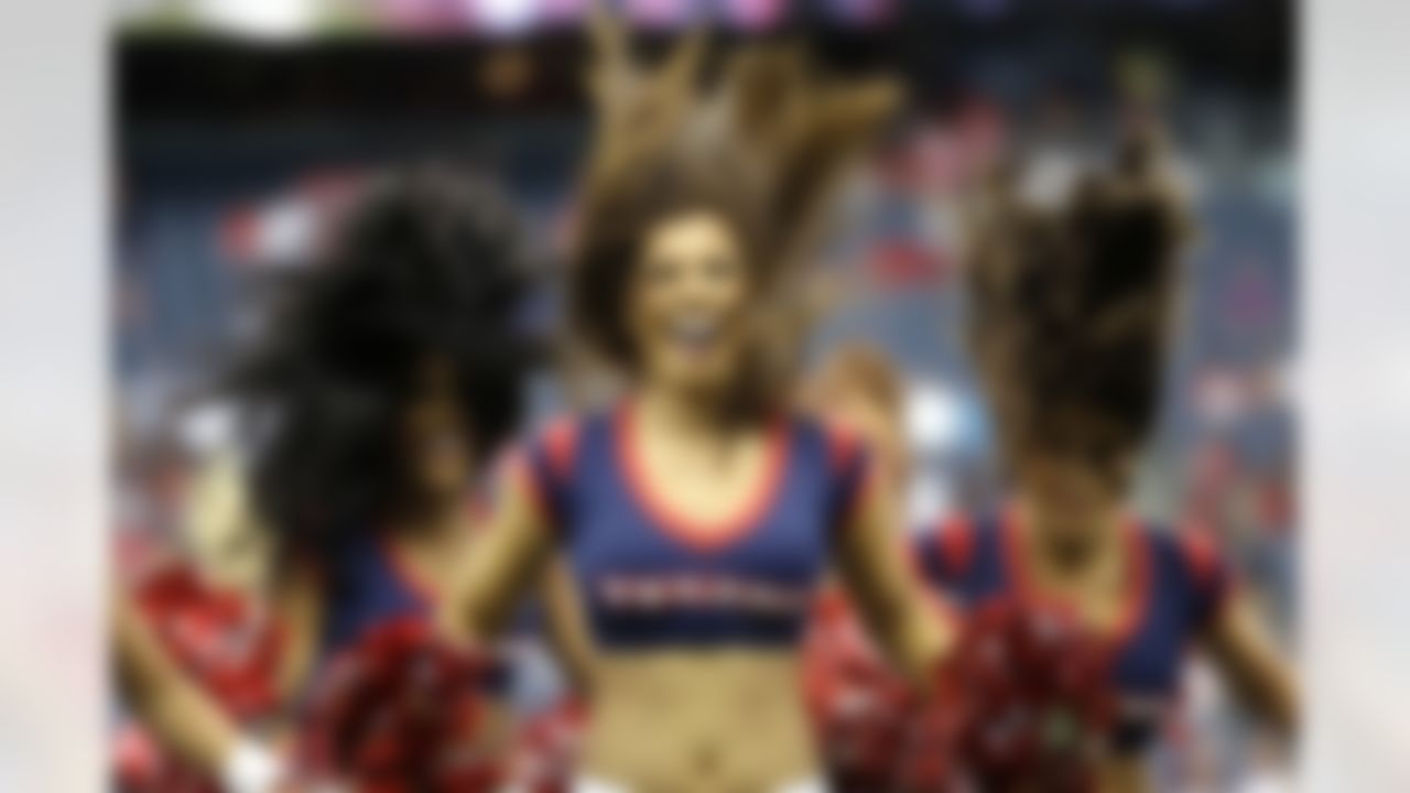 Houston Texans cheerleaders perform before an NFL football preseason game against the San Francisco 49ers Thursday, Aug. 28, 2014, in Houston. (AP Photo/David J. Phillip)