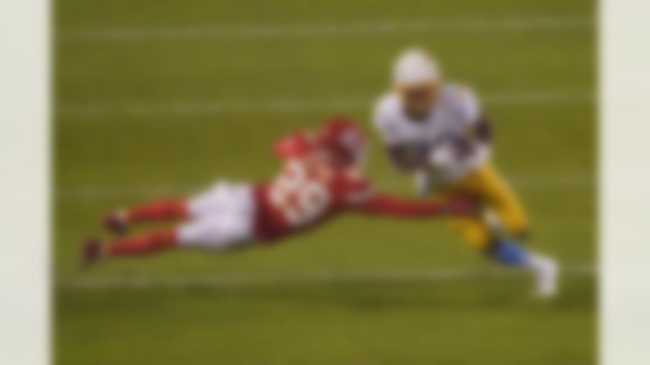 Los Angeles Chargers wide receiver Tyron Johnson breaks a tackle by Kansas City Chiefs cornerback BoPete Keyes (29) during the second half of an NFL football game, Sunday, Jan. 3, 2021, in Kansas City.