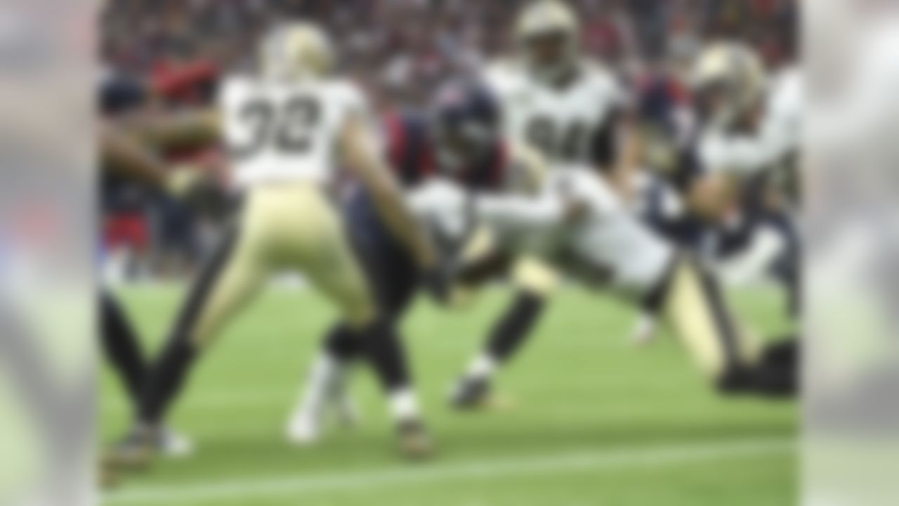 Houston Texans wide receiver Cecil Shorts (18) scores a touchdown as New Orleans Saints strong safety Kenny Vaccaro (32) and free safety Jairus Byrd (31) defend during the first quarter of an NFL football game, Sunday, Nov. 29, 2015, in Houston. (AP Photo/Eric Christian Smith)