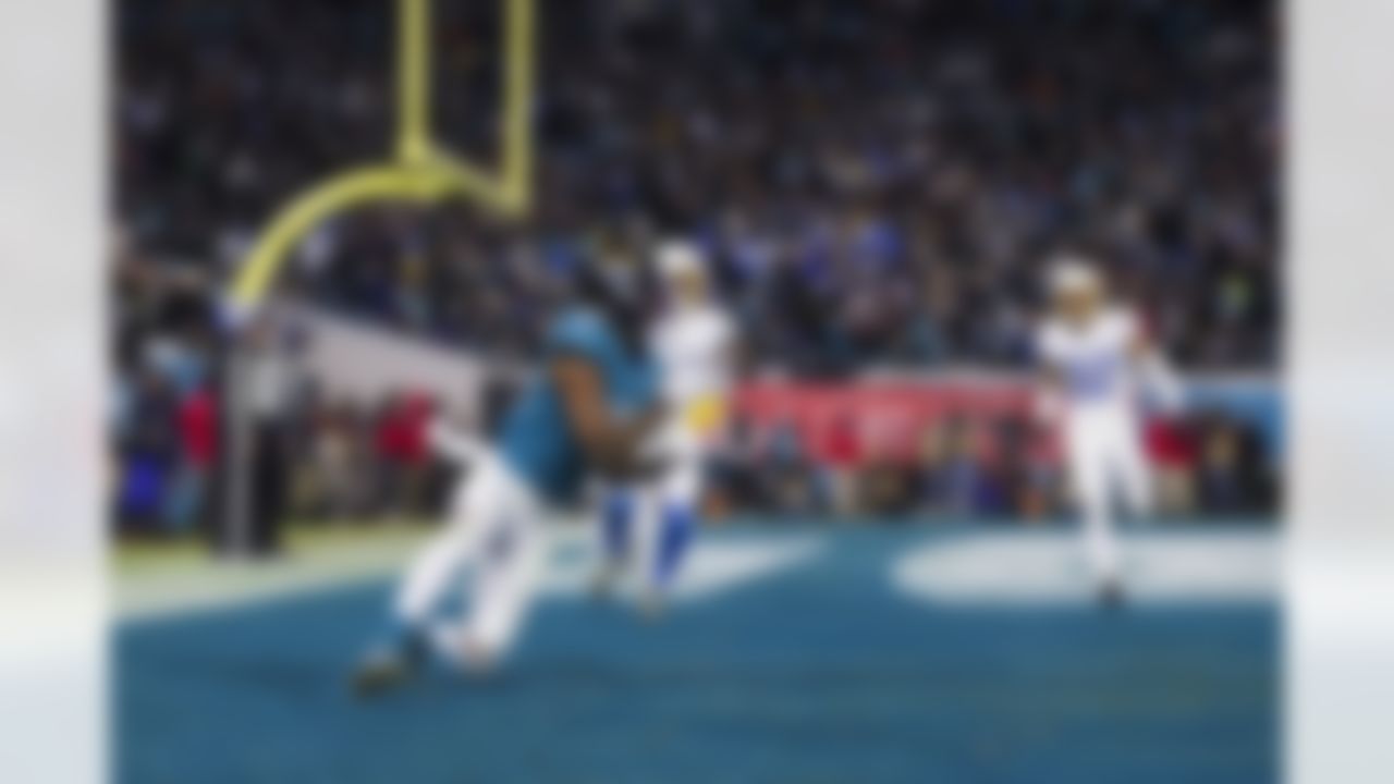 Jacksonville Jaguars wide receiver Marvin Jones Jr. (11) attempts a catch during an NFL Super Wild Card Weekend playoff game against the Los Angeles Chargers on Saturday, January 14, 2023 in Jacksonville, Florida.