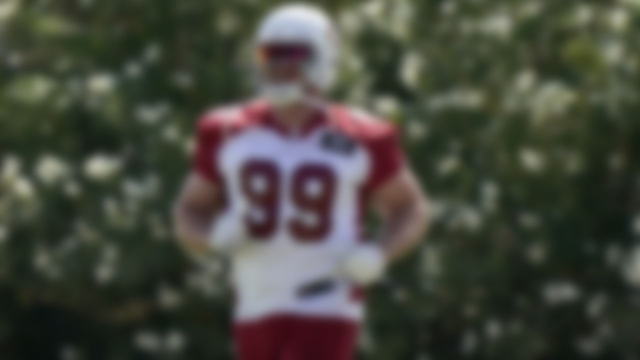 Arizona Cardinals defensive end J.J. Watt (99) runs drills during an NFL football minicamp, Tuesday, June 8, 2021, in Tempe, Ariz.