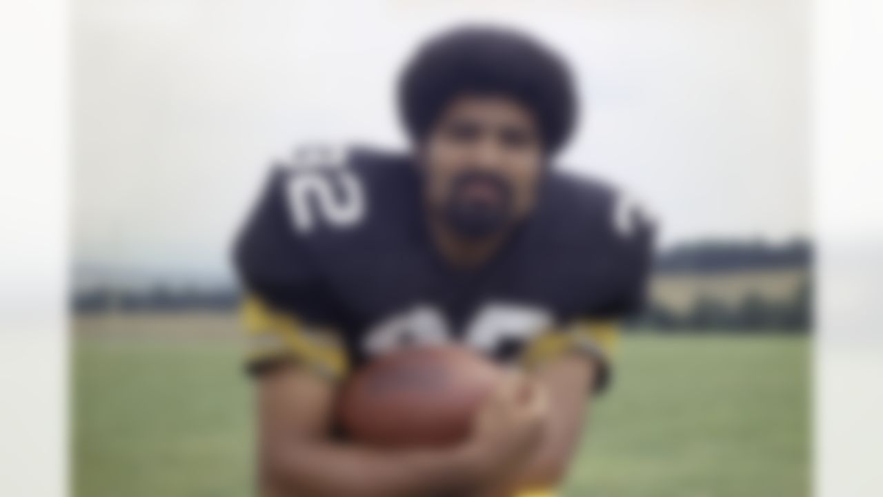 Pittsburgh Steelers running back Franco Harris is shown in 1973. Franco Harris, the Hall of Fame running back whose heads-up thinking authored "The Immaculate Reception," considered the most iconic play in NFL history, died Wednesday, Dec. 21, 2022. He was 72.