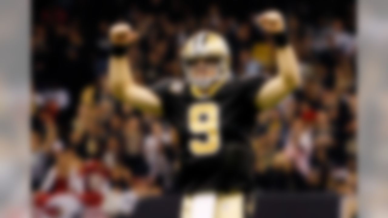 New Orleans Saints quarterback Drew Brees (9) celebrates a touchdown against the Arizona Cardinals at The Louisiana Superdome in New Orleans, Louisiana on January 16, 2010. (Aaron M. Sprecher/NFL.com)