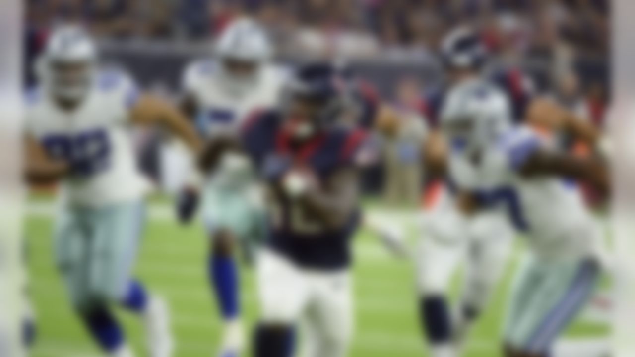 Houston Texans running back Terry Swanson (42) scores a touchdown against the Dallas Cowboys on a 37-yard run during the second half of a preseason NFL football game Thursday, Aug. 30, 2018, in Houston. (AP Photo/George Bridges)