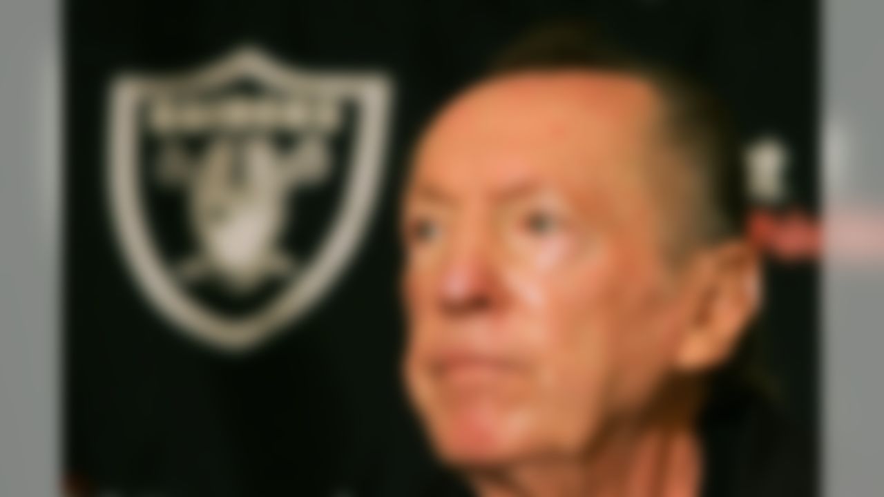 Oakland Raiders' owner Al Davis listens to questions during a news conference at football training camp in Napa, Calif., Tuesday, Aug. 1, 2006. (AP Photo/Jeff Chiu)