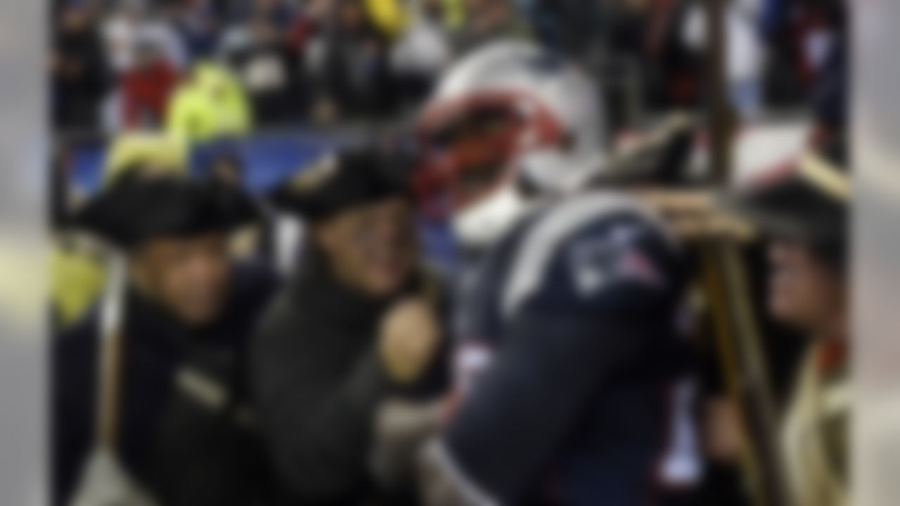 New England Patriots running back LeGarrette Blount celebrates with the end zone militia after a touchdown against the Indianapolis Colts in the third quarter in the AFC Championship Game at Gillette Stadium on Jan 18, 2015 in Foxborough, MA. (Robert Deutsch-USA TODAY Sports)