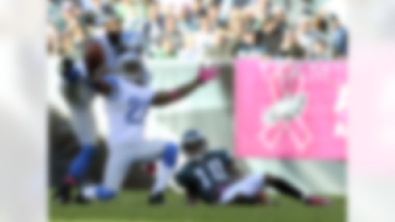 Detroit Lions cornerback Chris Houston (23) reacts after making an interception on a pass intended for Philadelphia Eagles wide receiver DeSean Jackson (10) during the second half an NFL football game, Sunday, Oct. 14, 2012, in Philadelphia. The Lions won 26-23 in overtime. (AP Photo/Michael Perez)