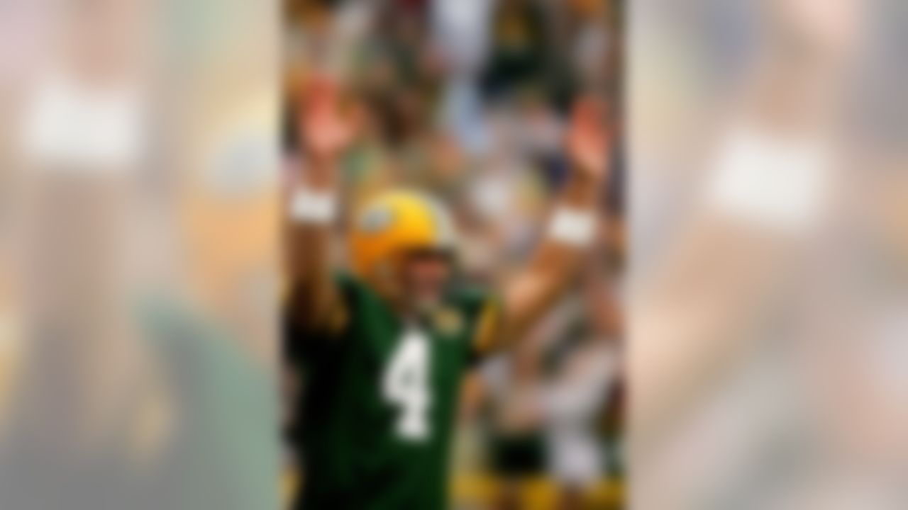 GREEN BAY, WI - OCTOBER 14:  Brett Favre #4 of the Green Bay Packers celebrates a touchdown against the Washington Redskins October 14, 2007 at Lambeau Field in Green Bay, Wisconsin.  (Photo by Matthew Stockman/Getty Images)