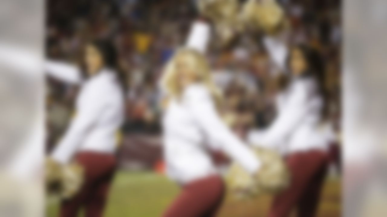 The Washington Redskins cheerleaders perform during the second half of an NFL wild card playoff football game against the Seattle Seahawks in Landover, Md., Sunday, Jan. 6, 2013. (AP Photo/Evan Vucci)