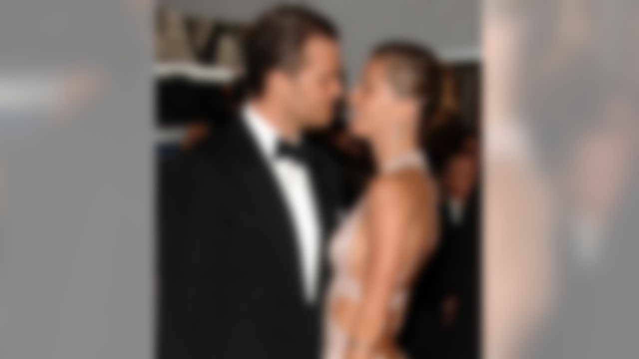 Here you see Brady at a high-class function with his wife Gisele Bundchen. But why do they both have the same haircut? That's bad.

And you are lucky that I won't use this photo, but only because slides scare me, too.