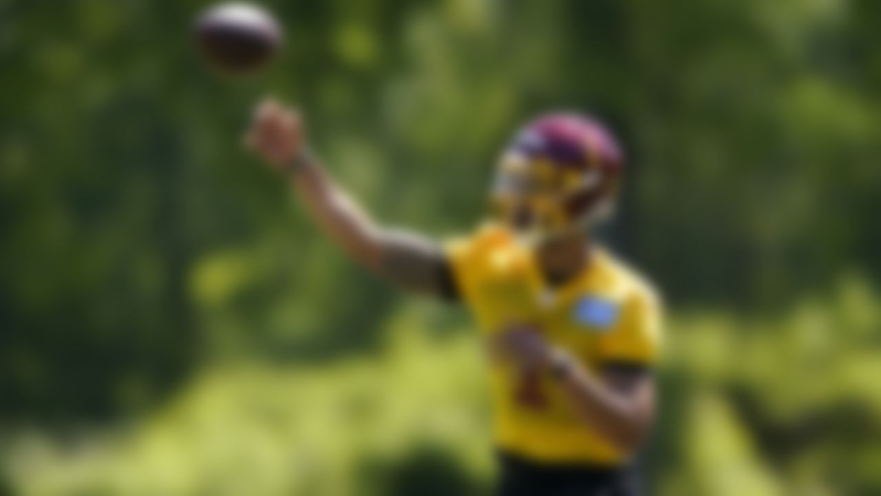 Washington Football Team quarterback Jordan Ta'amu runs a drill during an NFL football rookie minicamp at Inova Sports Performance Center in Ashburn, Va., Friday, May 14, 2021.