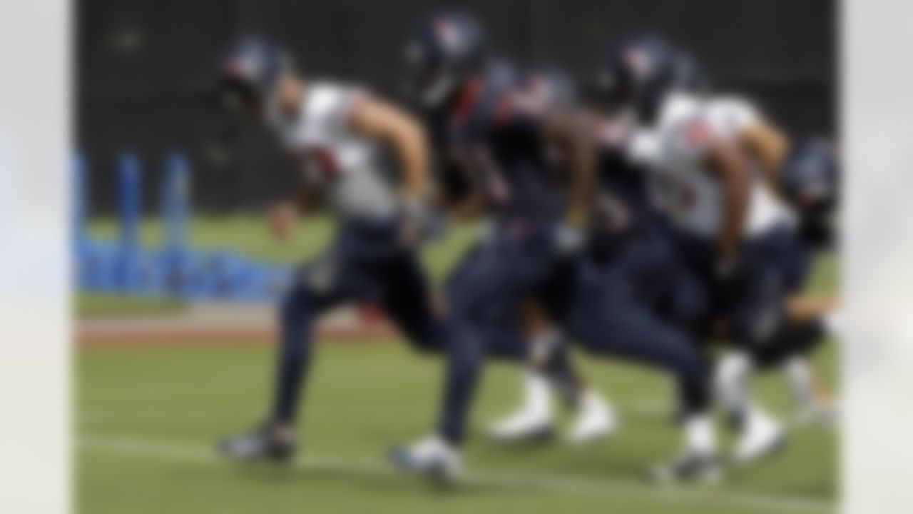 Houston Texans safety Bernard Pollard (31) runs drills with teammates during a NFL football workout Tuesday, May 25, 2010, in Houston. (AP Photo/David J. Phillip)