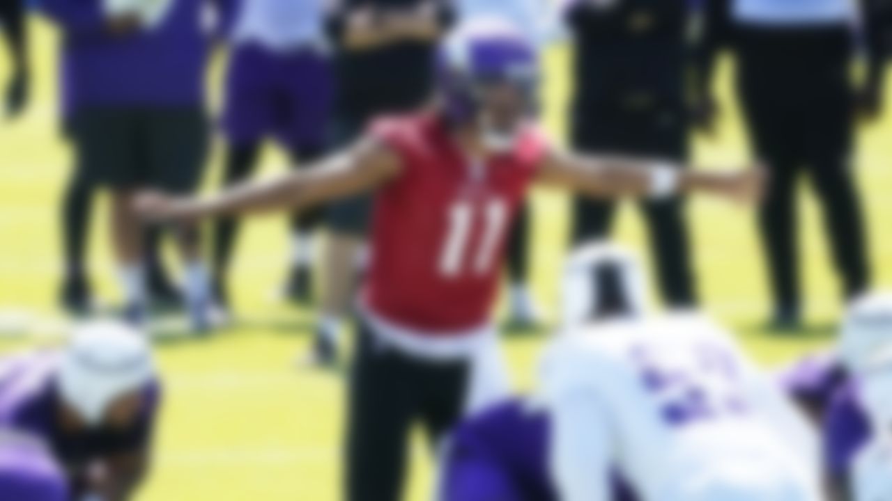 MinnesotaV ikings quarterback Kellen Mond runs a play during NFL football minicamp practice Tuesday, June 15, 2021, in Eagan, Minn.