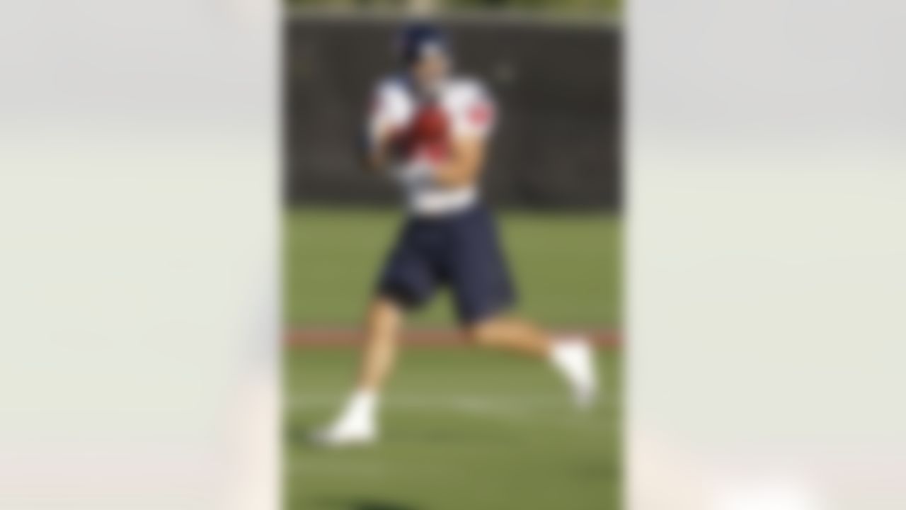 In this photo made Aug. 1, 2010, Houston Texans tight end James Casey catches a pass during a NFL football training camp practice,  in Houston. (AP Photo/David J. Phillip)