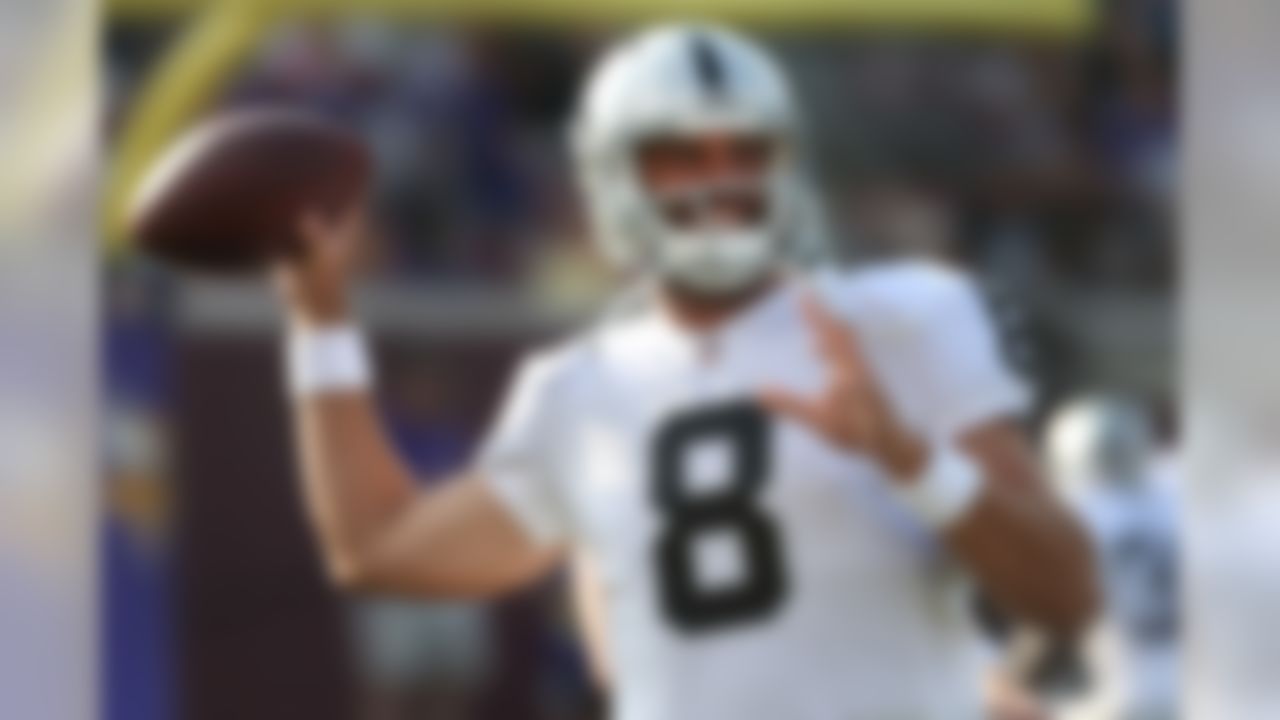 Oakland Raiders quarterback Matt Schaub throws before a preseason NFL football game against the Minnesota Vikings in Minneapolis, Friday, Aug. 8, 2014. (AP Photo/Jim Mone)