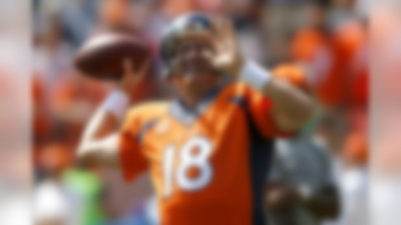 Denver Broncos quarterback Peyton Manning warms up prior to an NFL football game against the Kansas City Chiefs, Sunday, Sept. 14, 2014, in Denver. (AP Photo/Jack Dempsey)