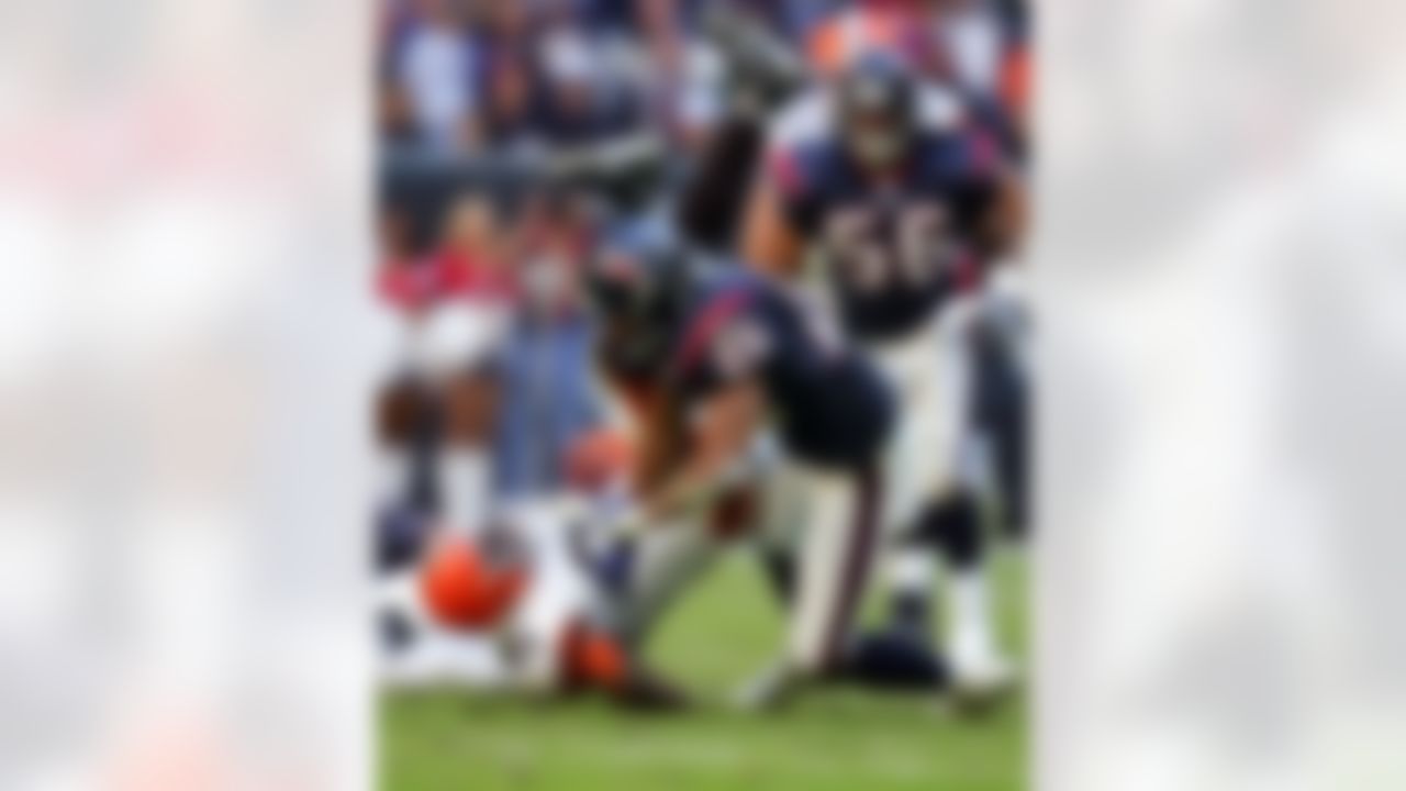 HOUSTON, TX - DECEMBER 31:   Reuben Droughns #34 of the Cleveland Browns is tackled by Glenn Earl #26 of the Houston Texans on December 31, 2006 at Reliant Stadium in Houston, Texas.  The Texans defeated the Browns 14-6. Photo by Getty Images.