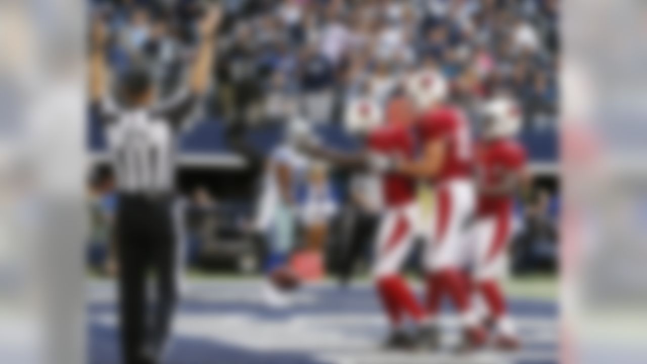 Arizona Cardinals wide receiver John Brown (13) celebrates his touchdown reception against the Dallas Cowboys. (AP Photo/Sue Ogrocki)