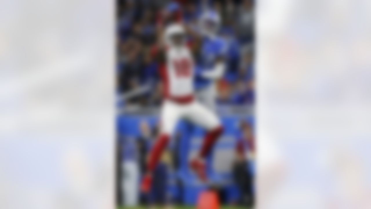 Arizona Cardinals wide receiver A.J. Green (18) makes a reception during an NFL football game against the Detroit Lions on Sunday, Dec. 19, 2021 in Detroit, Michigan.
